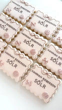 Load image into Gallery viewer, Custom logo cookies for Hannah Roberson x SOLR brand event
